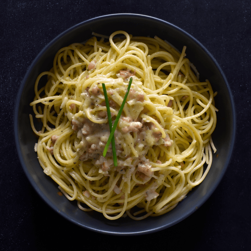 Carbonara Trufada con Panceta Ibérica y Pecorino Curado
