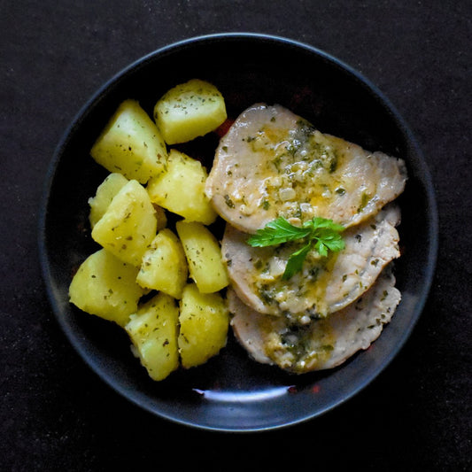 Lomo de cerdo al ajillo con patatas deluxe